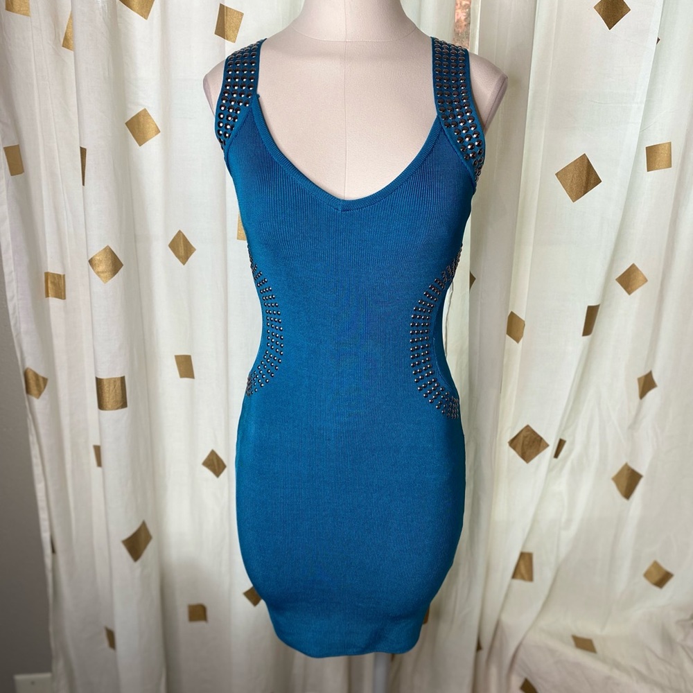 Silver embellished body con Bebe dress